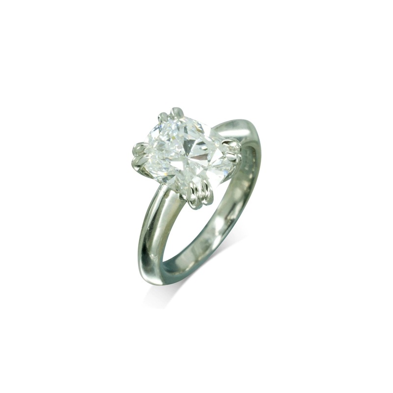Claw Set Platinum Cushion Shaped Diamond Engagement Ring