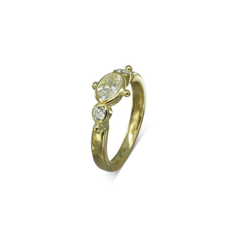 Beaded Yellow Gold Oval Diamond Trilogy Engagement Ring