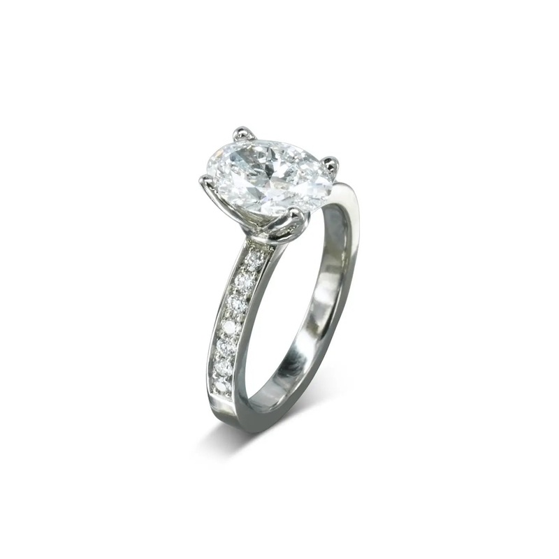 Claw Oval Diamond Engagement Ring and Pav Set Diamond Band