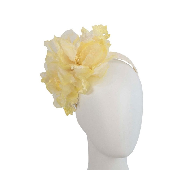Light yellow flower fascinator by Fillies Collection