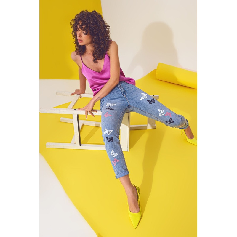 Butterfly Detail Skinny Jeans In Light Blue Wash