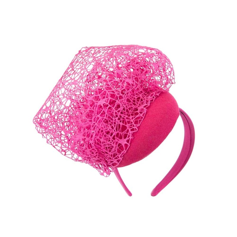 Unusual fuchsia winter fascinator