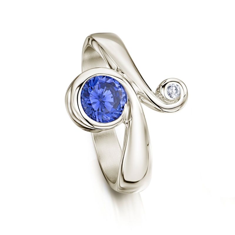 9ct White Gold Swirl Ring with Large Tanzanite