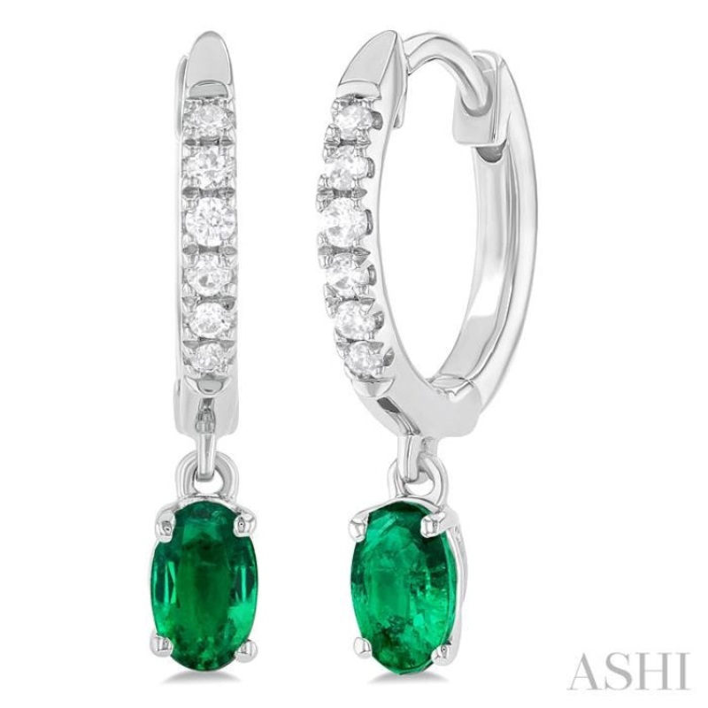 5×3 MM Oval Cut Emerald and 1/8 ctw Petite Round Cut Diamond Precious Fashion Huggies in 10K White Gold