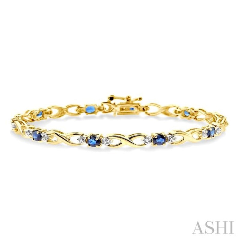 4×3 MM Oval Cut Sapphire and 1/10 ctw Single Cut Diamond Bracelet in 14K Yellow Gold