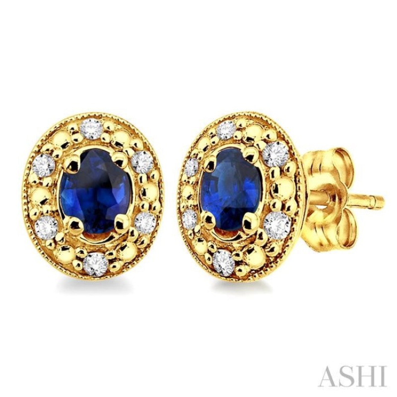 4×3 MM Oval Shaped Sapphire and 1/10 ctw Single Cut Diamond Earrings in 14K Yellow Gold