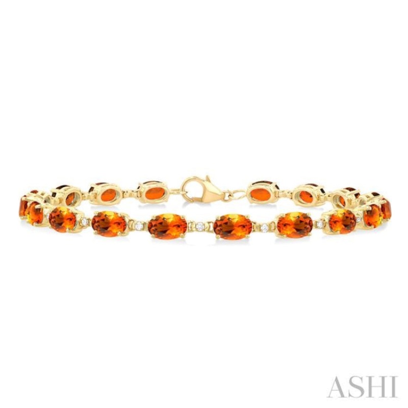 6X4 MM Oval Cut Citrine and 1/6 ctw Round Cut Diamond Semi Precious Tennis Bracelet in 10K Yellow Gold